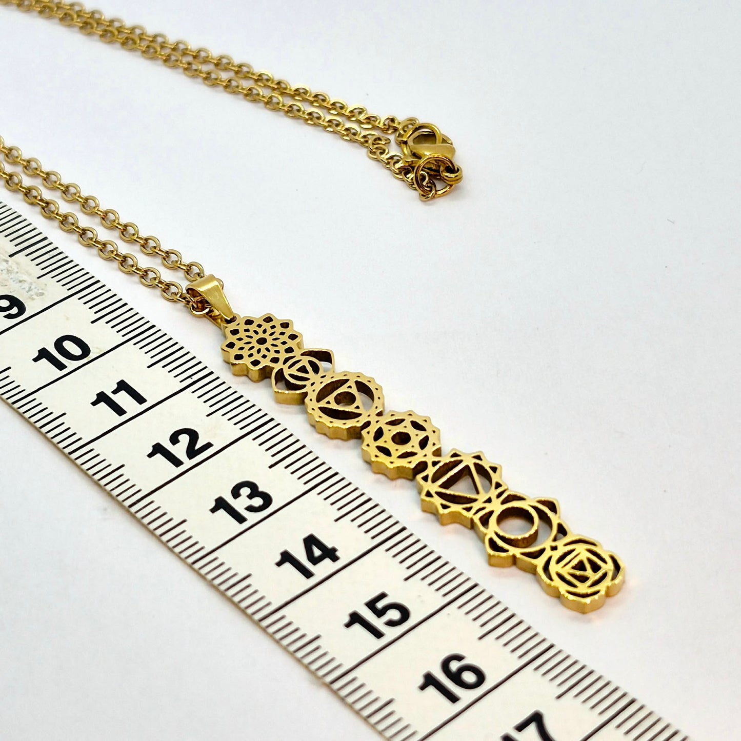 The 7 Chakra's Pendant with Chain Necklace in Gold Platted Stainless Steel